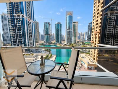 1 Bedroom Flat for Rent in Jumeirah Lake Towers (JLT), Dubai - Sage-green interior with lake view-11. png