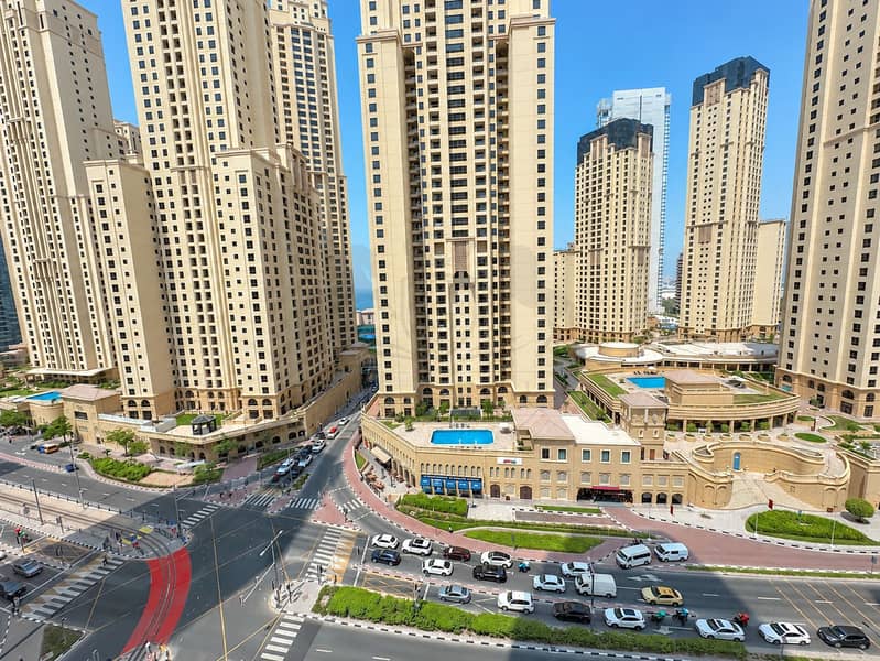17 Dubai Marina Towers and Curved City Intersection. png