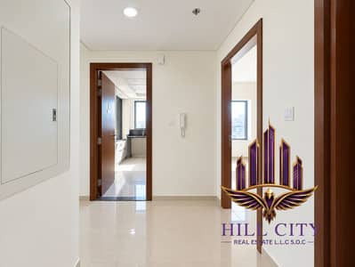 فلیٹ 1 غرفة نوم للايجار في البدع، دبي - Bright Minimalist Apartment Hallway. png