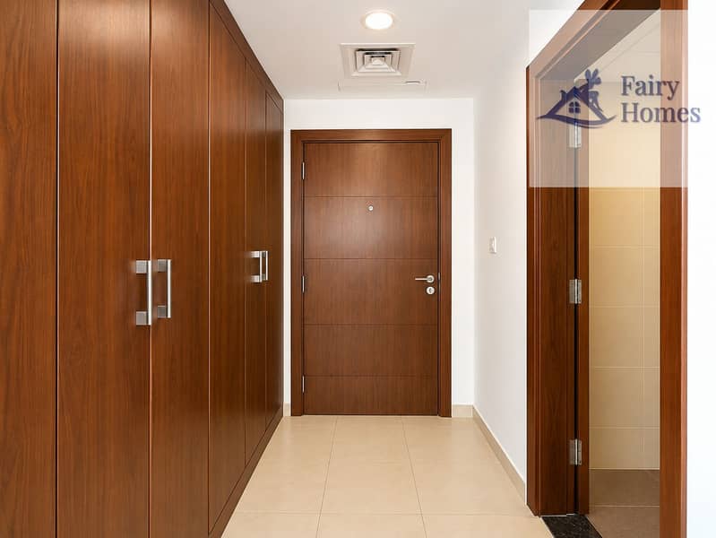 10 Modern Warm Wood Entryway. png