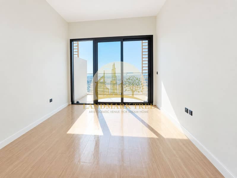 5 Sunlit Minimalist Room with Balcony Views (1). png
