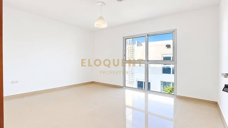 5 Bright Minimalist Room with Window Views. png