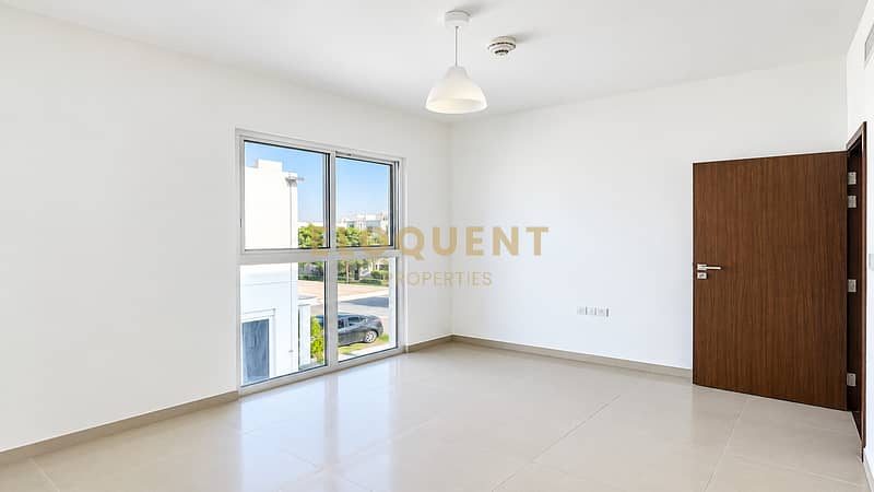 7 Bright Minimalist Room with Window and Door. png