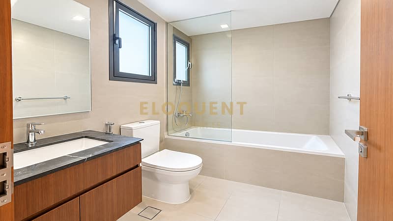 8 Bright Modern Bathroom with Wood Vanity. png