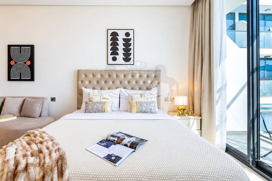 7 Sunlit Modern Bedroom with Balcony Views. png