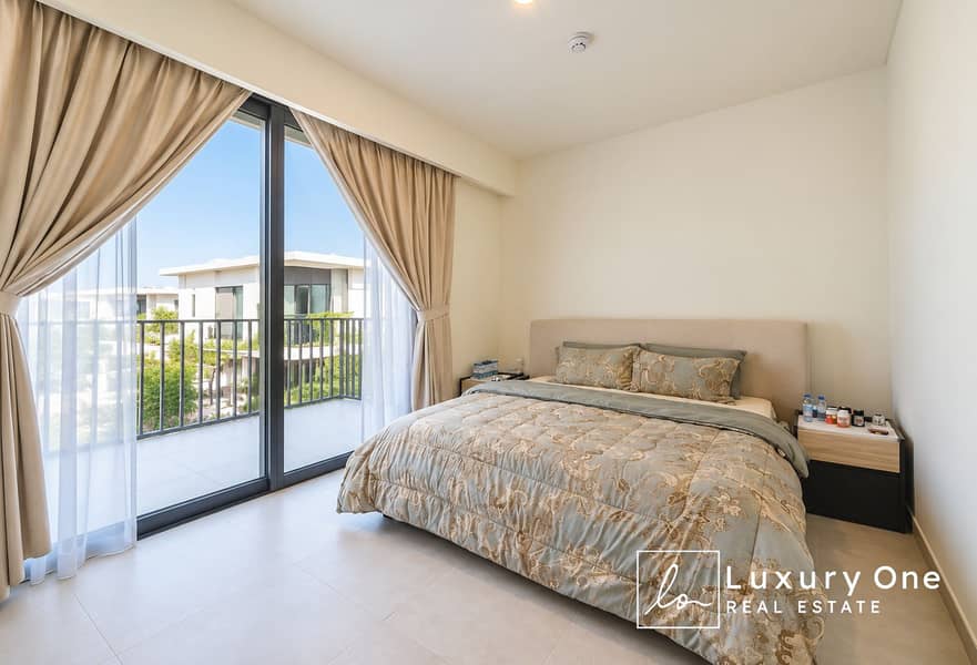 5 Modern Bedroom with Balcony Views. png
