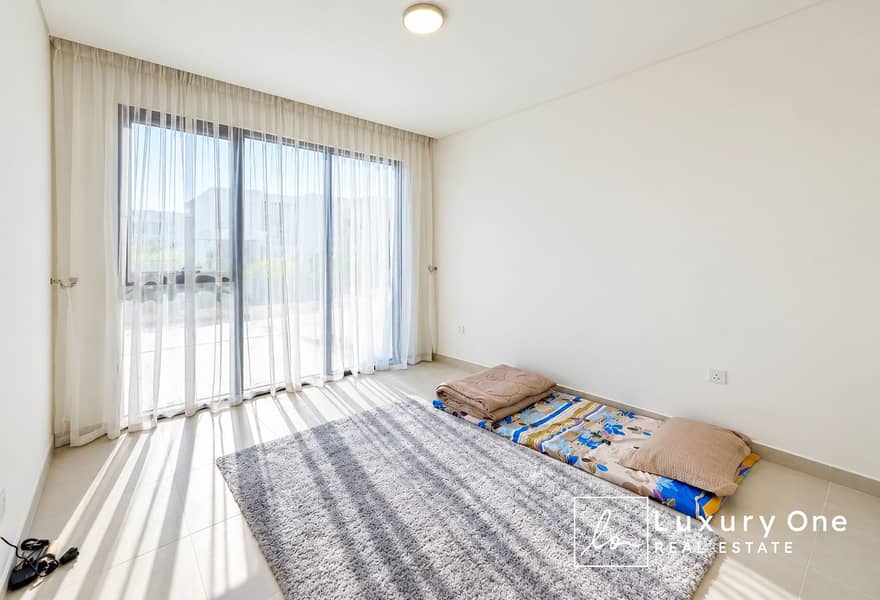 7 Sunlit Minimalist Bedroom with Floor Bedding. png