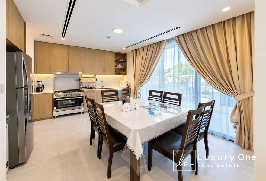 9 Modern Kitchen Dining Room with Bright Windows. png