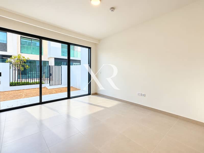5 Sunlit Minimal Living Room with Courtyard Views. png
