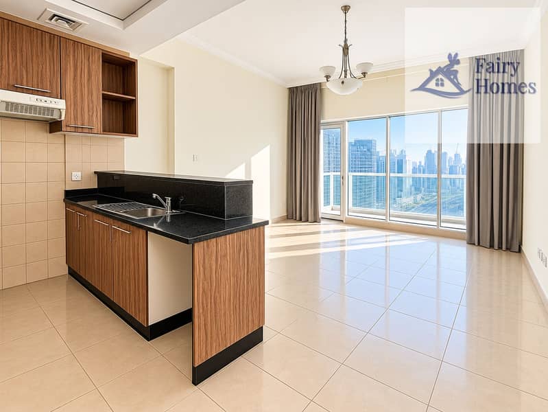 2 Sunlit Modern Kitchen and Skyline Living Area. png