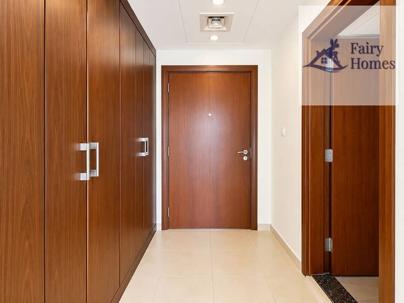 13 Modern Warm Wood Apartment Entryway. png