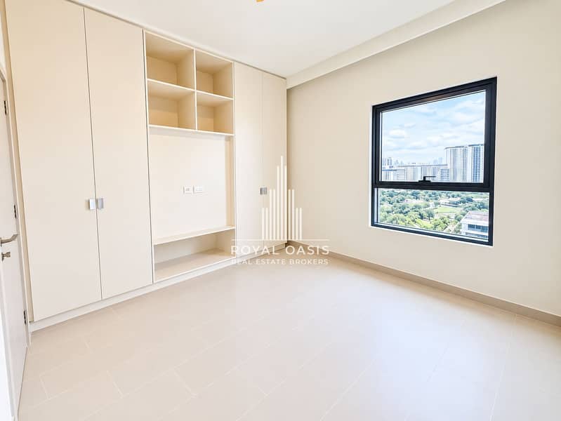 7 Minimalist Room with Built-In Wardrobe and City View. png