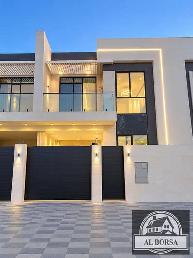 4 Bedroom Villa for Sale in Al Yasmeen, Ajman - Modern Twilight Villa with Illuminated Gate. png