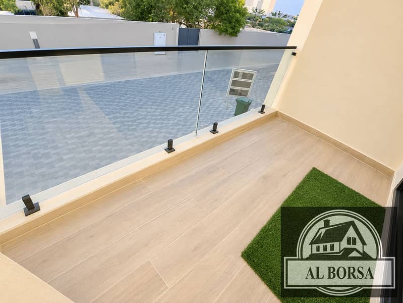 18 Bright Modern Balcony with Glass Railing. png
