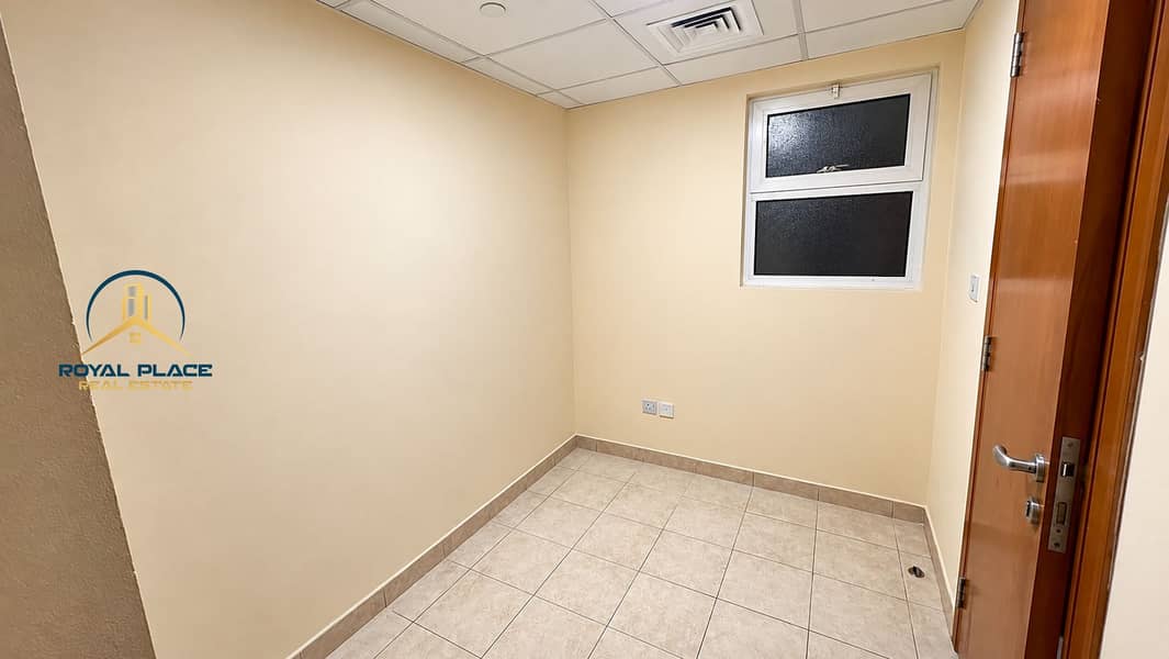 6 Empty Beige Utility Room with Window. png