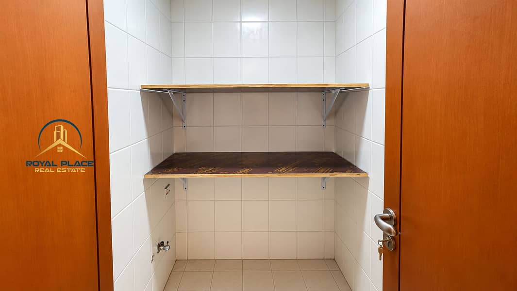 10 Tidy Tiled Utility Closet. png