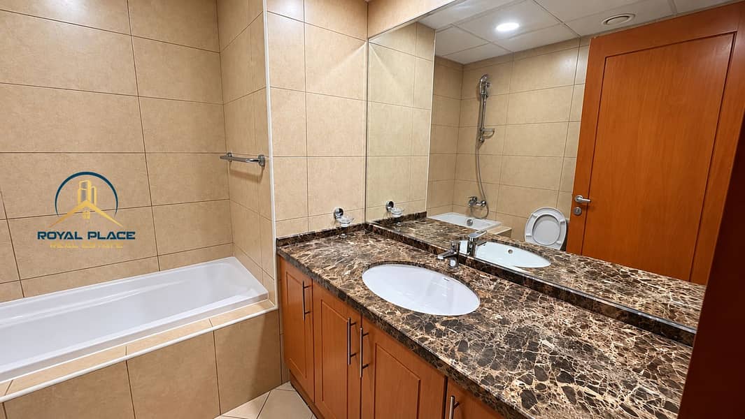 20 Modern Beige Bathroom with Marble Vanity. png