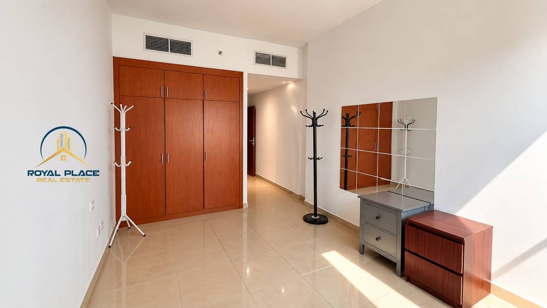 4 Minimalist Sunlit Room with Wardrobe and Mirrors. png