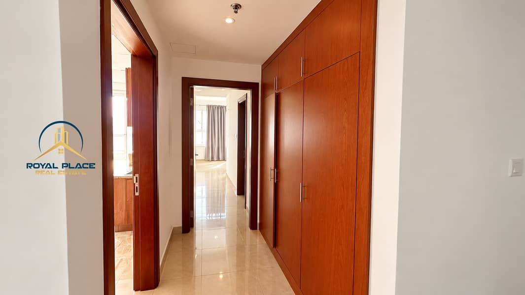 7 Modern Wood-Paneled Apartment Hallway. png