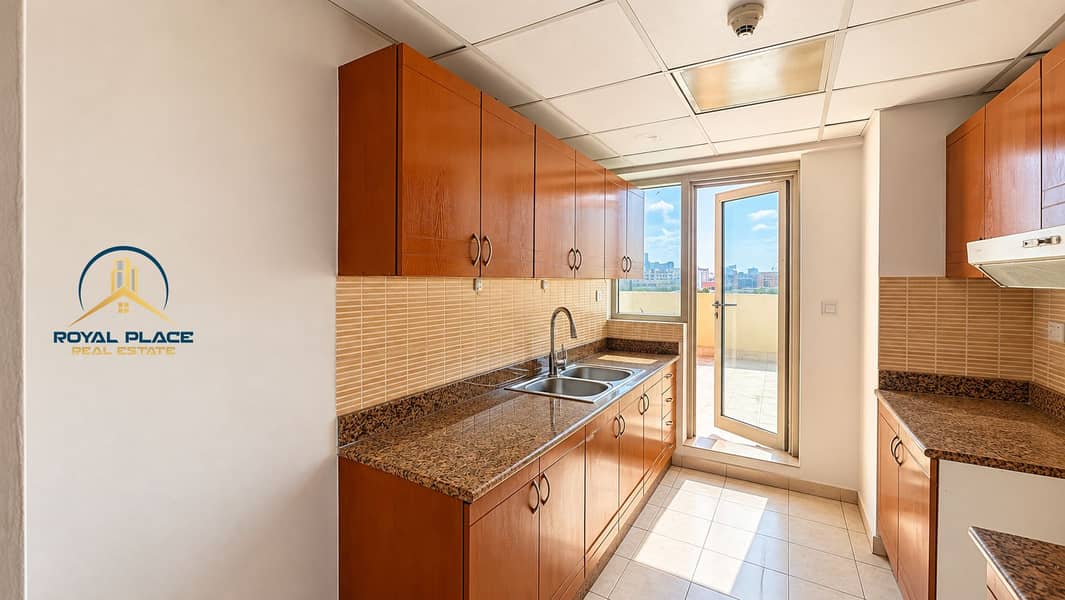 9 Sunlit Modern Galley Kitchen. png