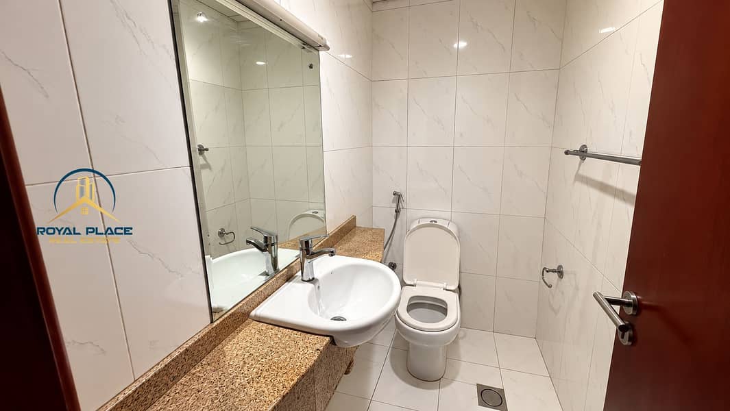 11 Modern Marble Bathroom with Granite Vanity. png