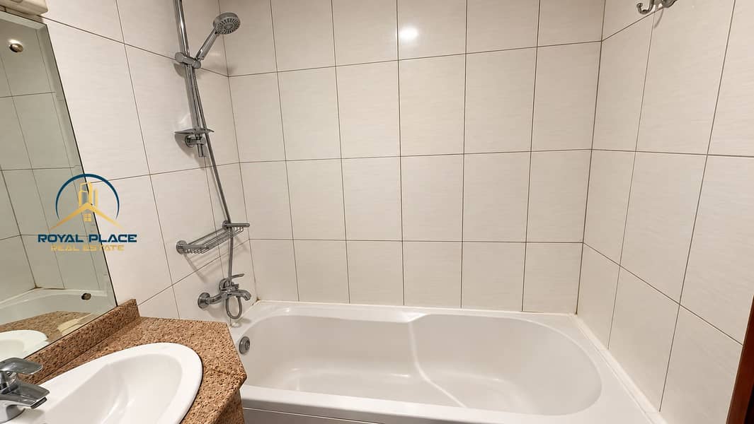 13 Modern Tiled Bathtub Bathroom. png