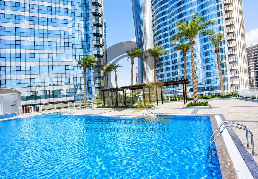 15 Sparkling Pool and Blue Glass Towers-3. png