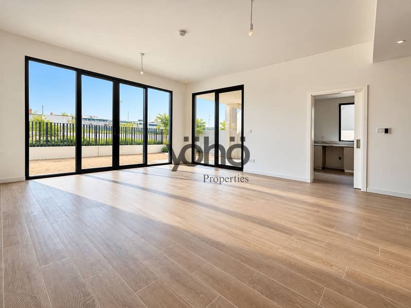 2 Sunlit Modern Living Room with Garden Views. png