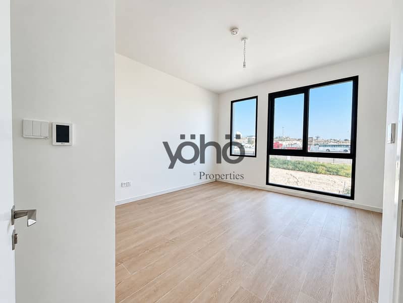17 Bright Minimalist Room with Urban Views. png