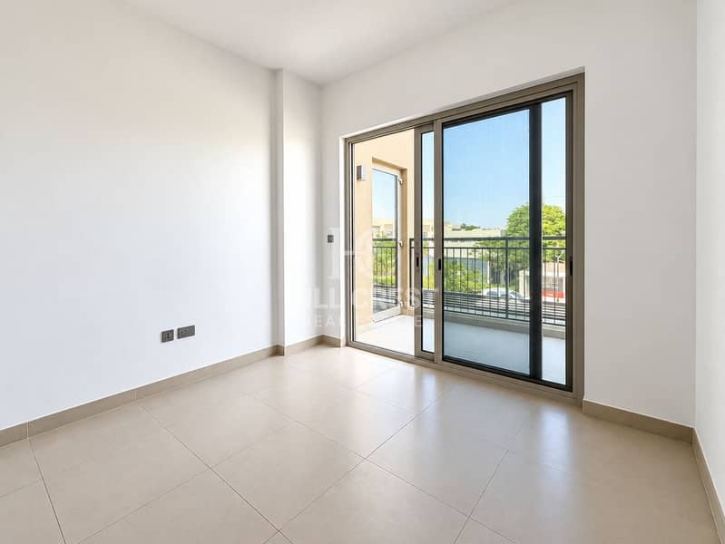 11 Bright Minimalist Room with Balcony View. png