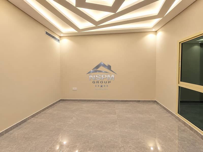 3 Minimalist Room with Geometric Ceiling Lighting. png