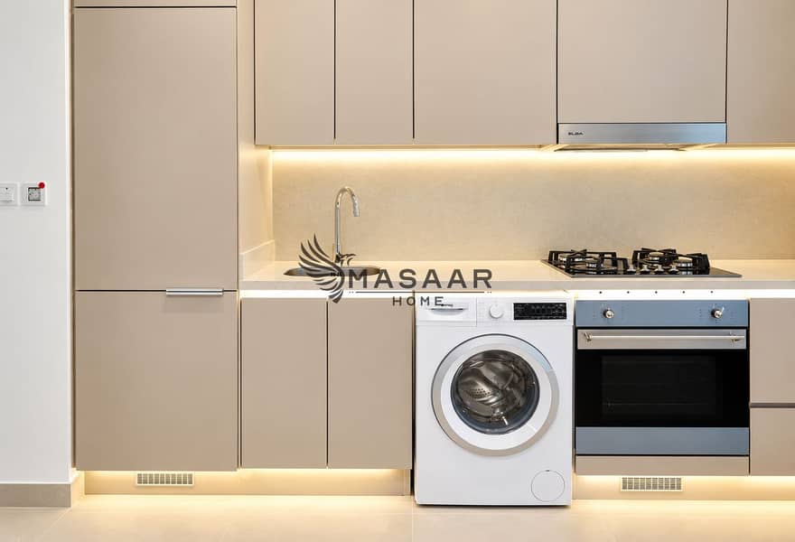 4 Minimalist Taupe Kitchen with Integrated Appliances. png