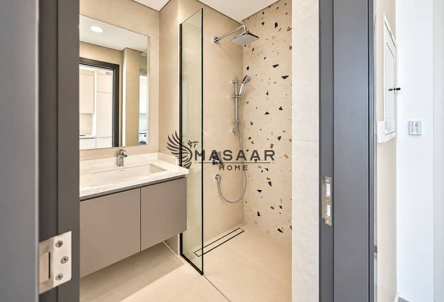 6 Modern Beige Bathroom with Walk-In Shower. png