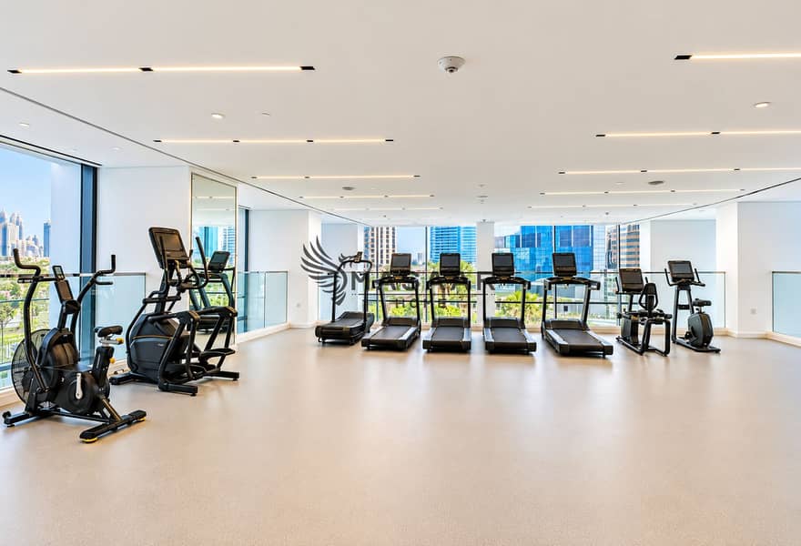 7 Bright High-Rise Gym with City Views. png