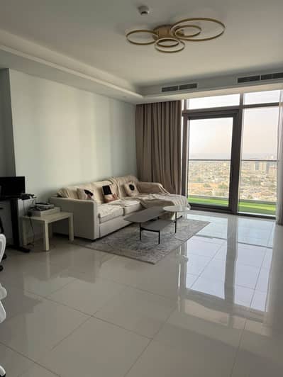 1 Slaapkamer Appartement te Huur in Business Bay, Dubai - Paramount Living room. jpg 1 Slaapkamer Appartement te Huur in Business Bay, Dubai - Paramount Living room. jpg