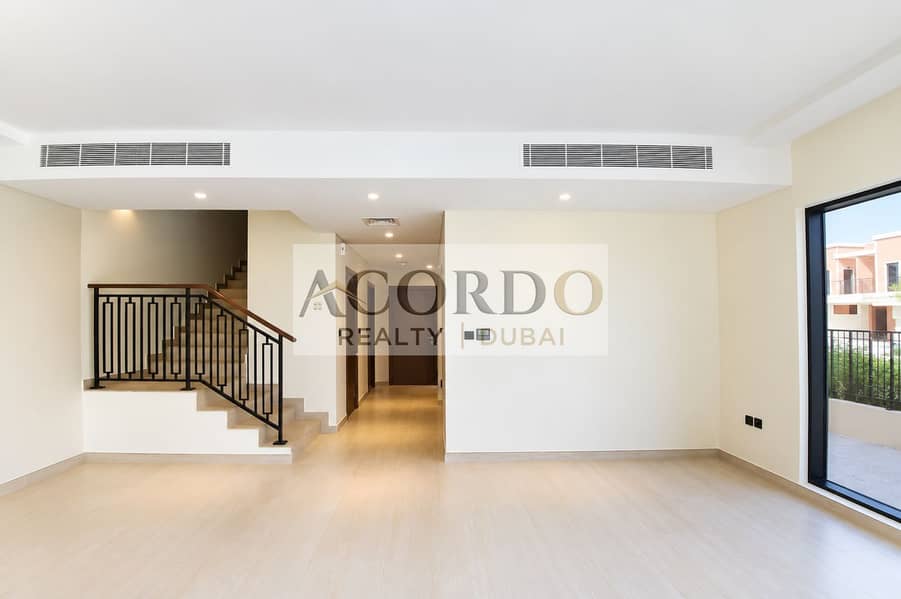 3 Bright Minimalist Interior with Staircase and Courtyard View. png