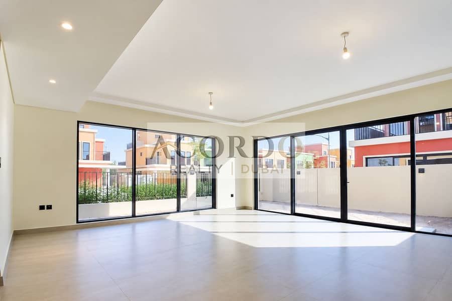 4 Sunlit Minimalist Room with Glass Walls. png