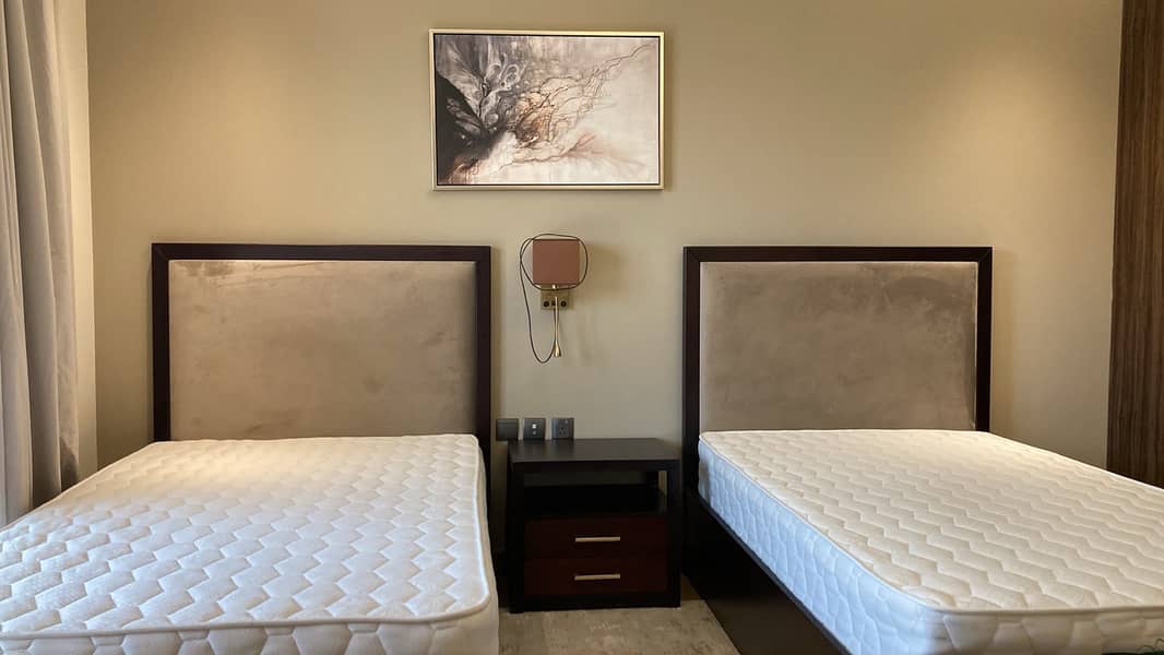 9 1014 Elite Downtown Twin Bedroom 1. jpeg