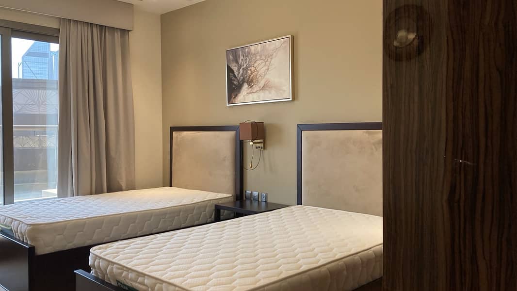 12 1014 Elite Downtown Twin Bedroom 2. jpeg