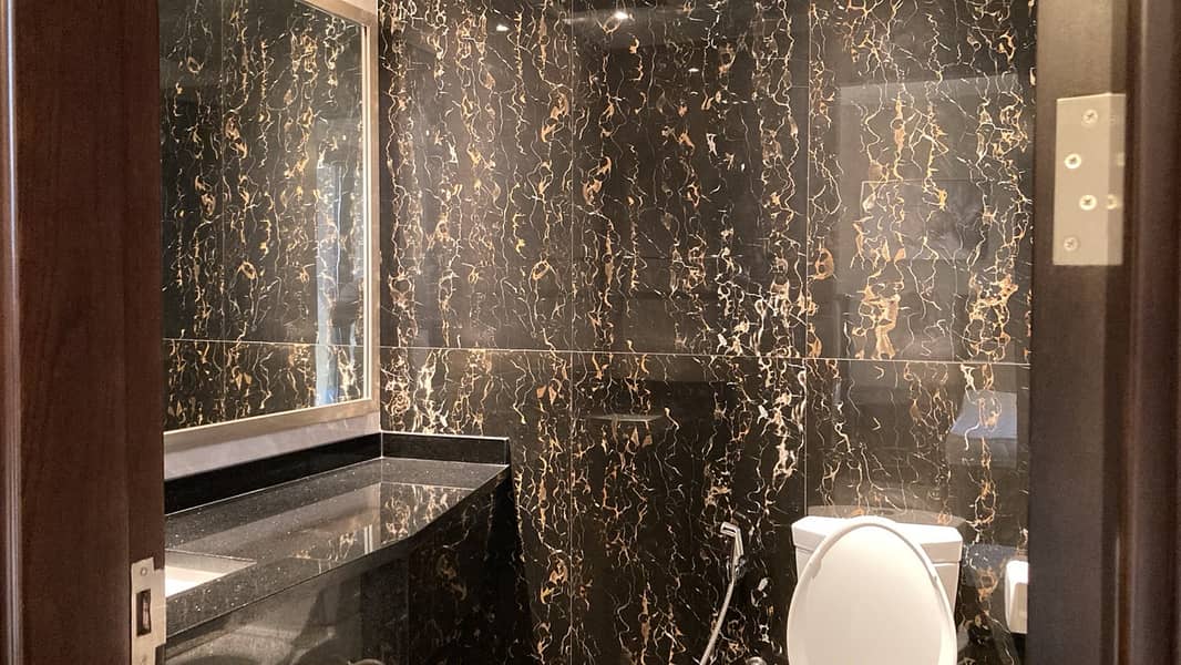 19 1014 Elite Downtown Guest Bathroom. jpeg