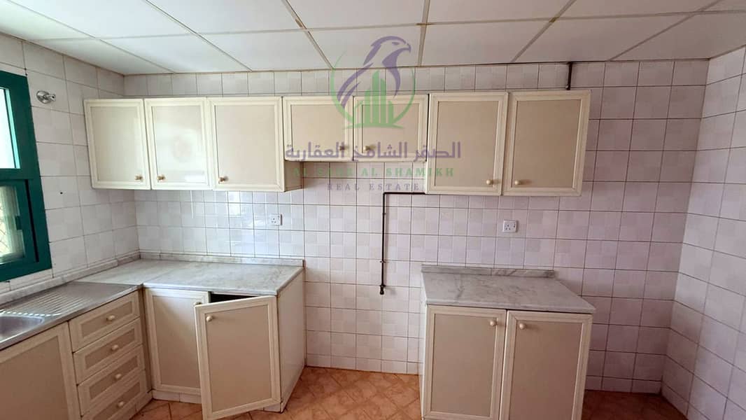 15 apartment-for-rent-2-bedroom-altaawn-alsharqh-kitchen-08. jpg