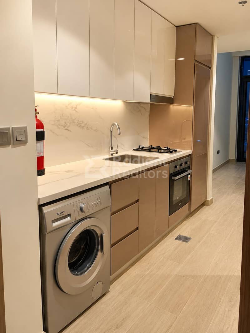 5 Warm Modern Galley Kitchen Interior. jpg