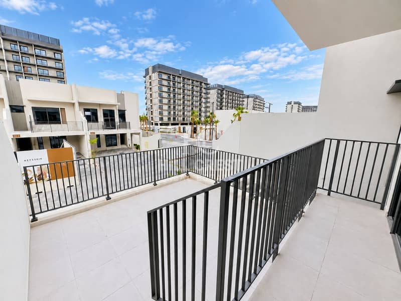 43 Modern Balcony Overlooking Urban Complex. png