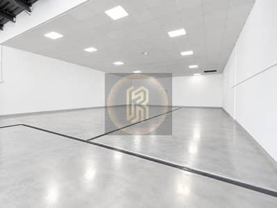 Warehouse zum Miete in Al Quoz, Dubai - Bright Empty Industrial Warehouse Interior. png Warehouse zum Miete in Al Quoz, Dubai - Bright Empty Industrial Warehouse Interior. png