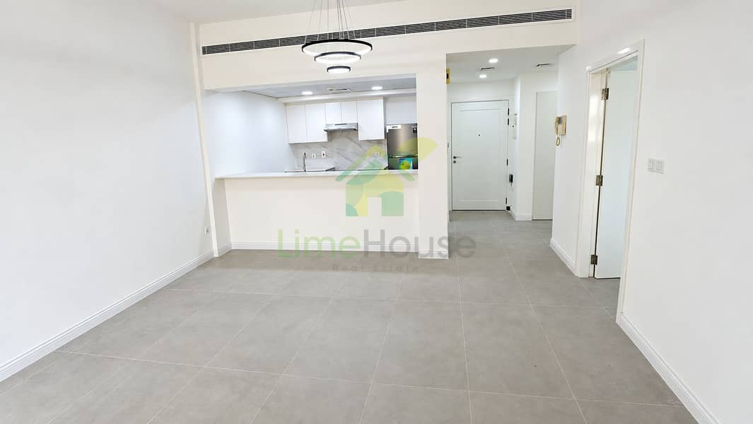 02-dubai-the-greens-al-arta-4-1br-apartment-living-dining-kitchen. jpg 02-dubai-the-greens-al-arta-4-1br-apartment-living-dining-kitchen. jpg