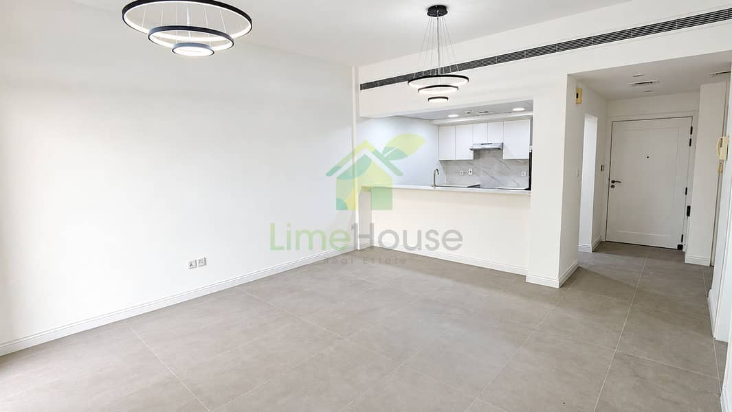 2 01-dubai-the-greens-al-arta-4-1br-apartment-living-kitchen-hero. jpg