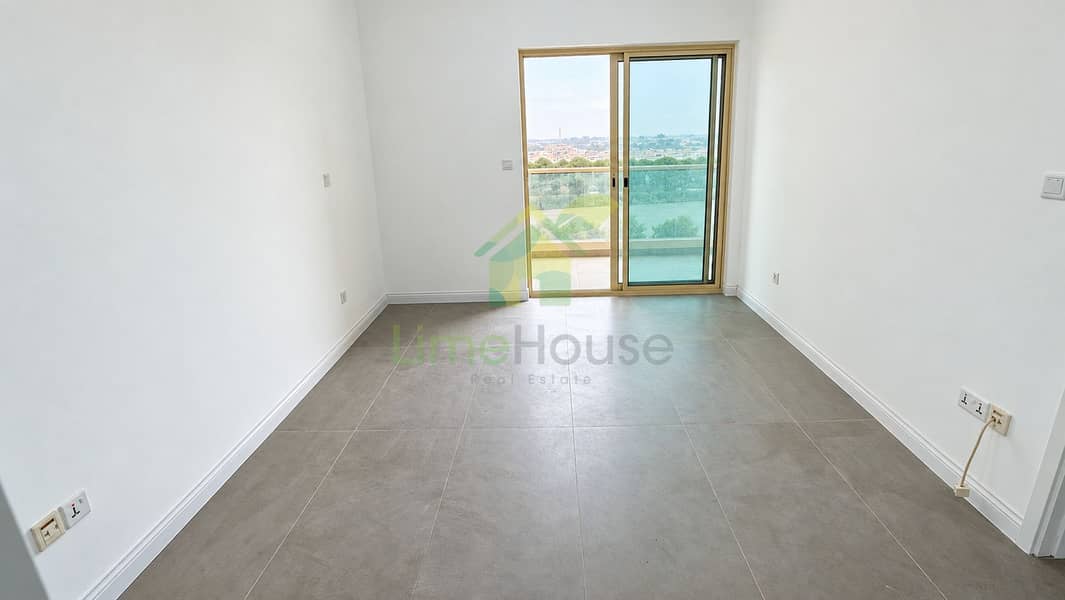 3 04-dubai-the-greens-al-arta-4-1br-apartment-room-balcony-door. jpg