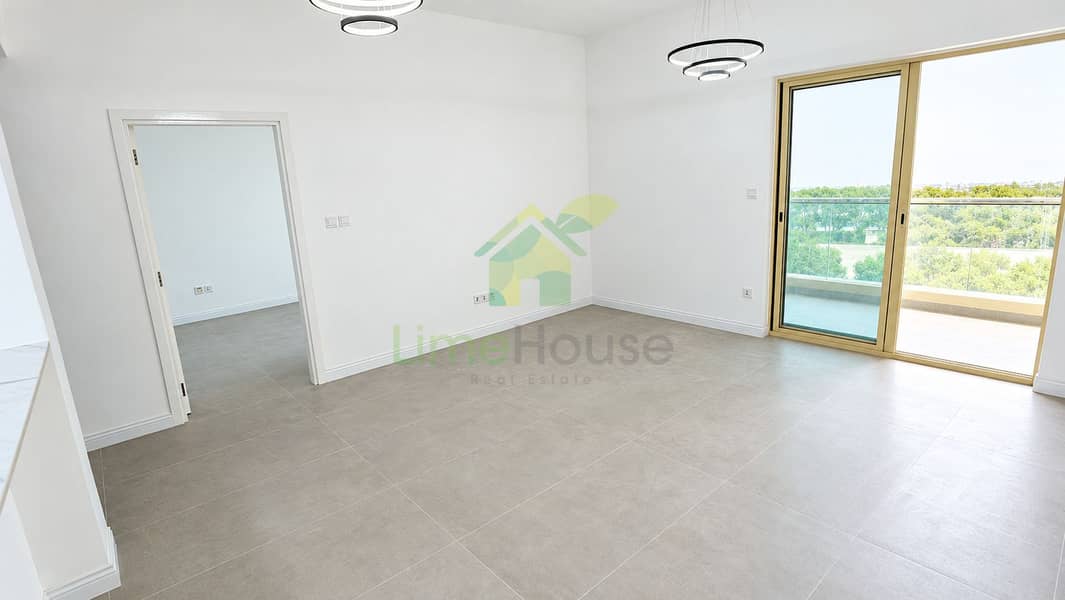 4 03-dubai-the-greens-al-arta-4-1br-apartment-living-balcony-access. jpg