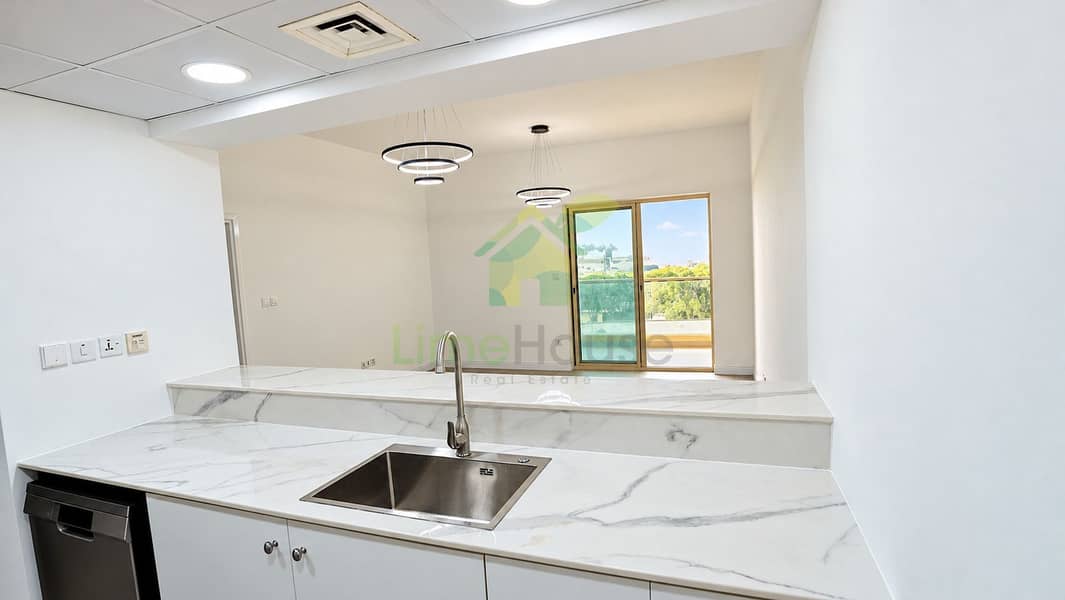 5 07-dubai-the-greens-al-arta-4-1br-apartment-kitchen-marble-counter. jpg
