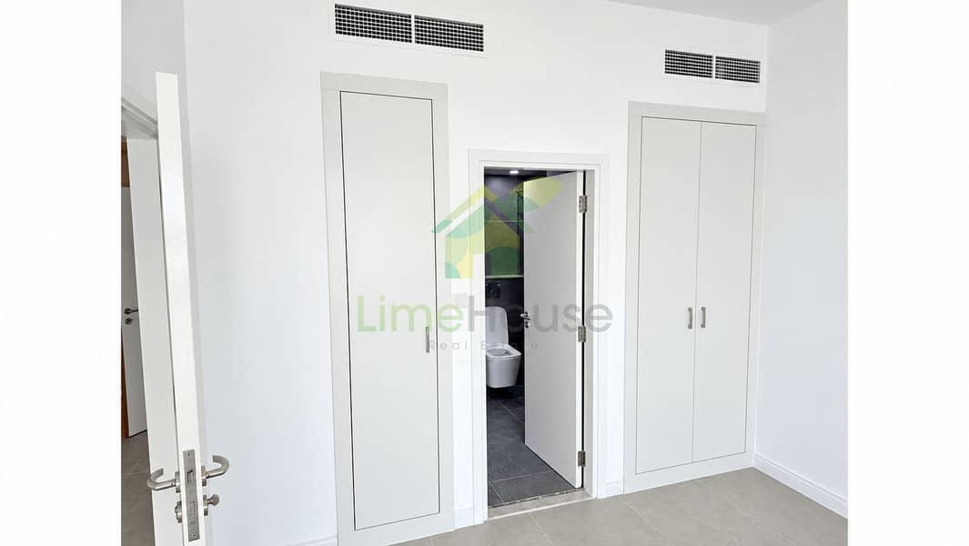 9 09-dubai-the-greens-al-arta-4-1br-apartment-bedroom-wardrobes-ensuite. jpg